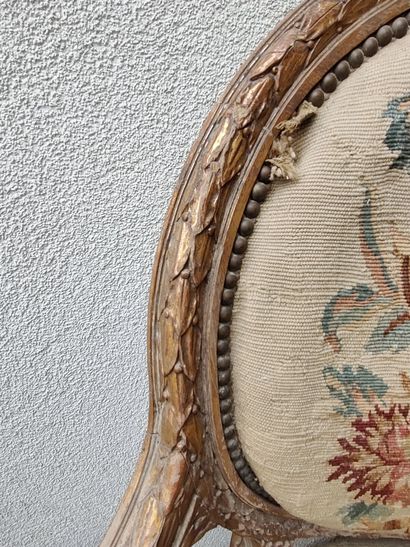 Pair of molded, carved and partially gilded...