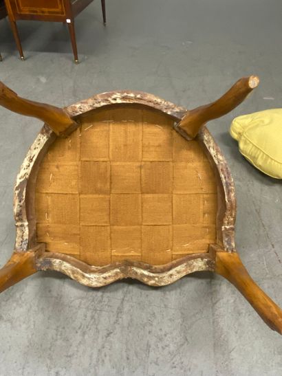 A set of four cabriolet armchairs in natural...