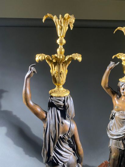 Pair of large patinated bronze and gilt bronze...