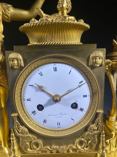 Gilt bronze and chased terminal clock decorated...