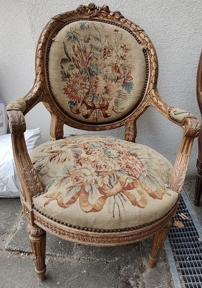 Pair of molded, carved and partially gilded...