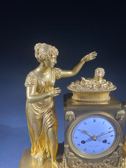 Gilt bronze and chased terminal clock decorated...