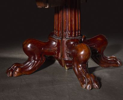 Large circular mahogany dining table, the...