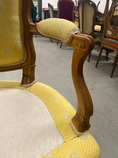 A set of four cabriolet armchairs in natural...