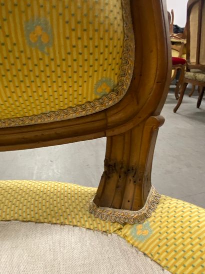 A set of four cabriolet armchairs in natural...