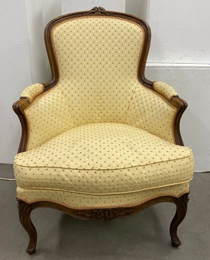 Pair of bergères in natural wood, molded...