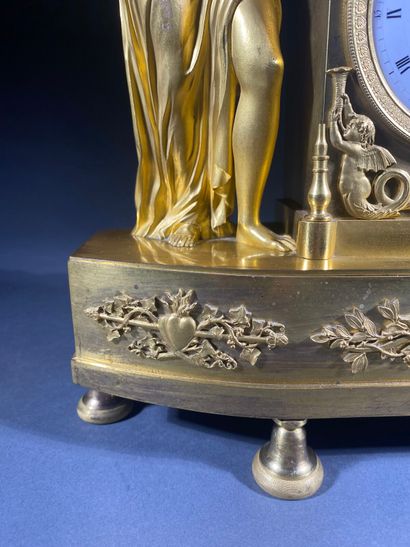 Gilt bronze and chased terminal clock decorated...