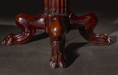 Large circular mahogany dining table, the...