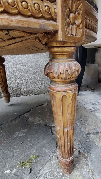 Pair of molded, carved and partially gilded...