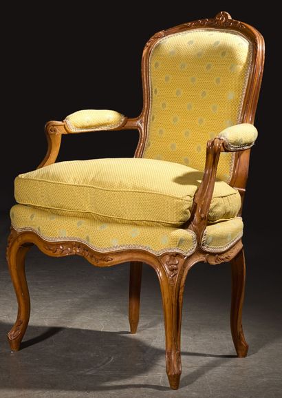 A set of four cabriolet armchairs in natural...