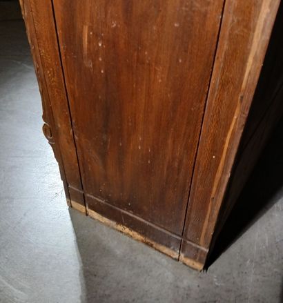 Carved walnut cabinet opening to five drawers...