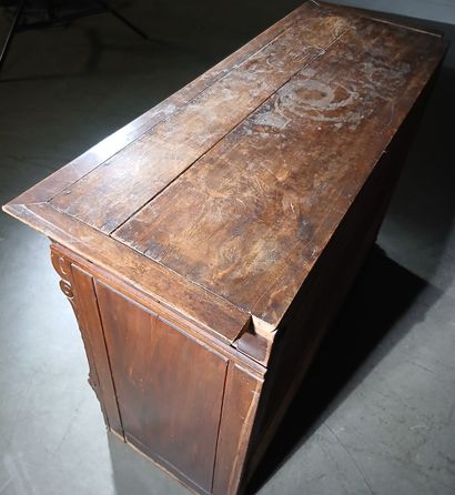 Carved walnut cabinet opening to five drawers...