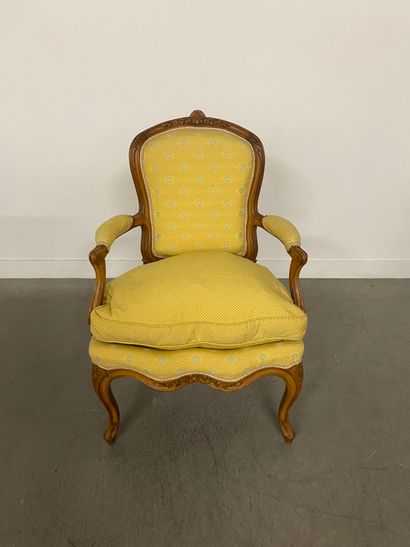 A set of four cabriolet armchairs in natural...