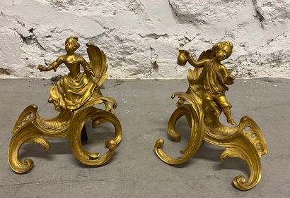 Pair of gilded bronze andirons, chiseled...