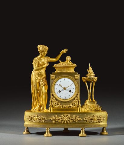 Gilt bronze and chased terminal clock decorated...