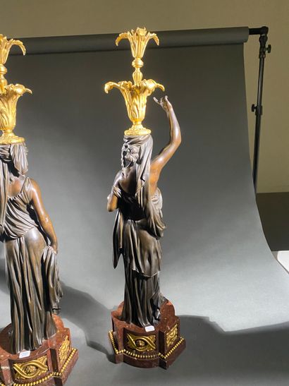Pair of large patinated bronze and gilt bronze...
