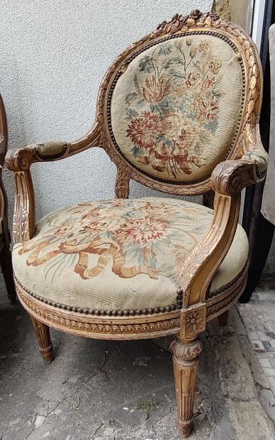 Pair of molded, carved and partially gilded...