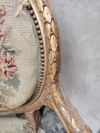 Pair of molded, carved and partially gilded...