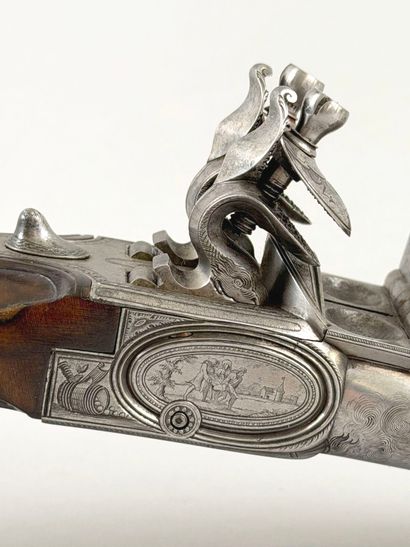 Important pistolet double à silex, aux armes...