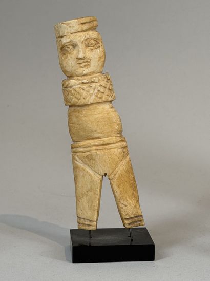 Stylized anthropomorphic figurine. 
Bovine...