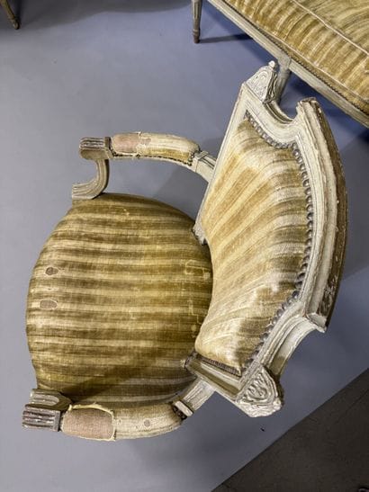 A set of six armchairs and one sofa, made...