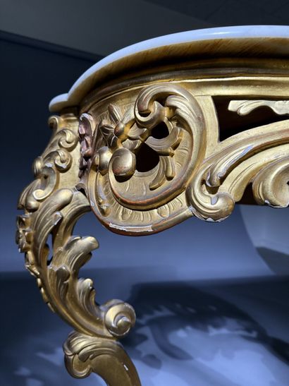 Carved and gilded wooden console table, resting...