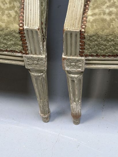 Pair of molded and painted beechwood armchairs...