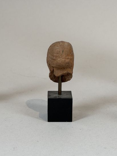 Set of three heads, including one grotesque...