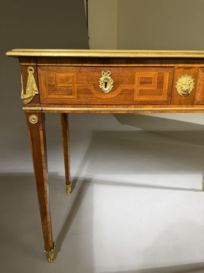 A small, flat desk made of rosewood and amaranth,...