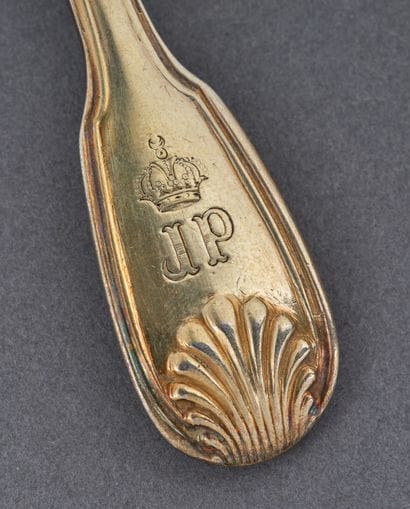 A dessert cutlery set in vermeil and filled...