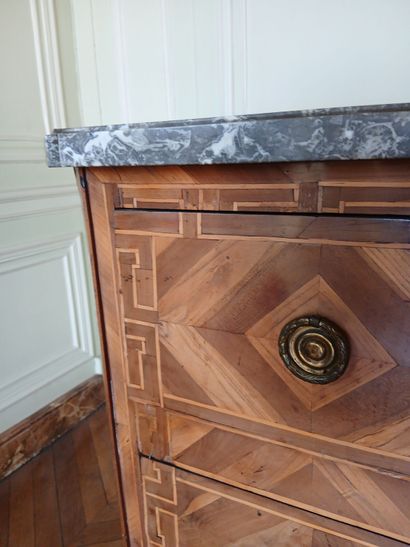 Center-recessed veneered wood chest of drawers...