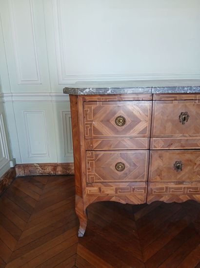 Center-recessed veneered wood chest of drawers...