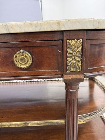 A pair of half-moon-shaped mahogany console...