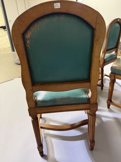 Ten chairs in molded beech with rounded backs,...