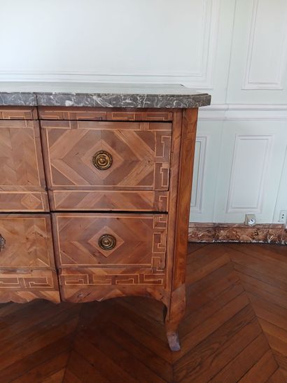 Center-recessed veneered wood chest of drawers...
