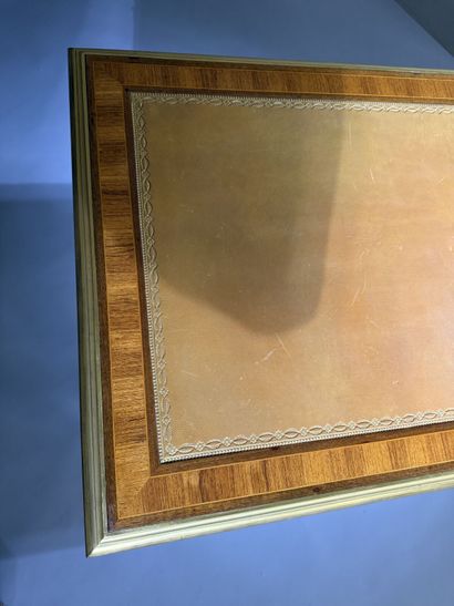 A small, flat desk made of rosewood and amaranth,...