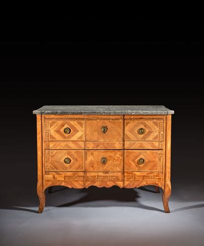 Center-recessed veneered wood chest of drawers...