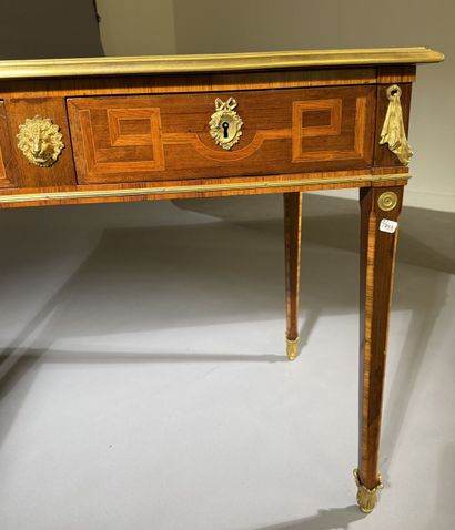 A small, flat desk made of rosewood and amaranth,...