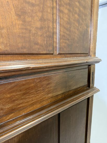 Two-section walnut cabinet with four-panel...