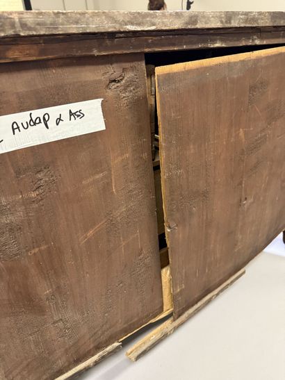 A rosewood chest of drawers with a curvilinear...