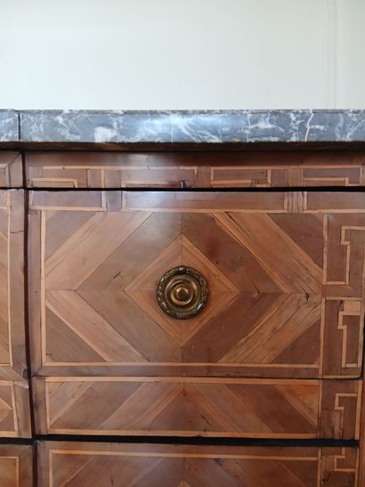 Center-recessed veneered wood chest of drawers...