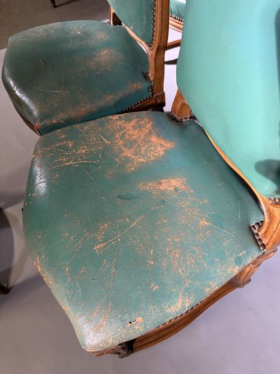 Ten chairs in molded beech with rounded backs,...
