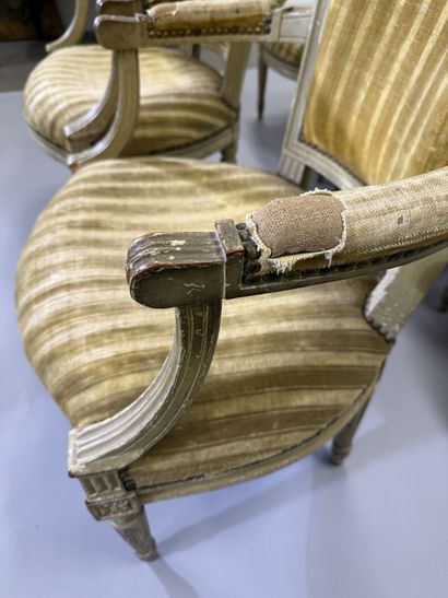 A set of six armchairs and one sofa, made...