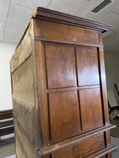 Two-section walnut cabinet with four-panel...
