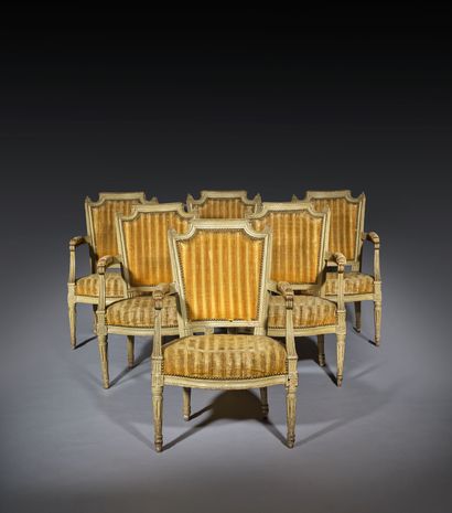 A set of six armchairs and one sofa, made...