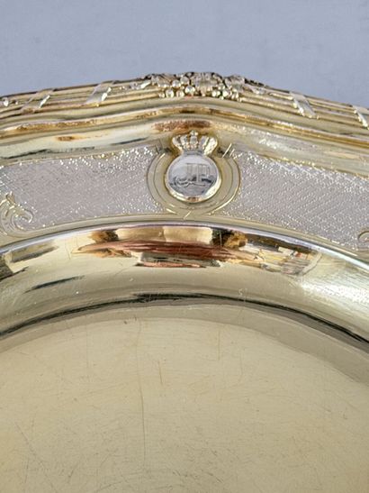 Set of twenty-four multi-lobed vermeil plates...