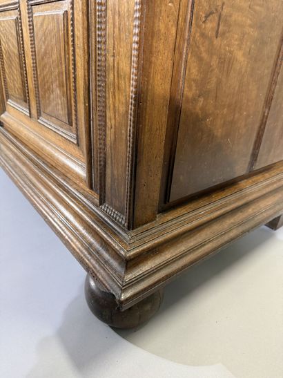 Two-section walnut cabinet with four-panel...