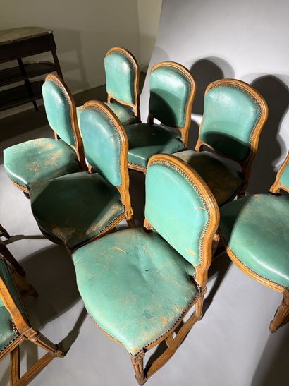 Ten chairs in molded beech with rounded backs,...