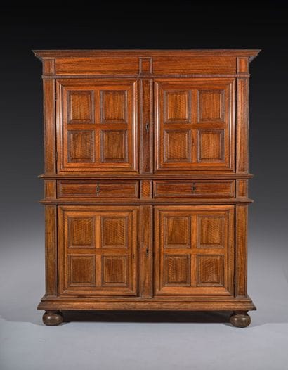 Two-section walnut cabinet with four-panel...