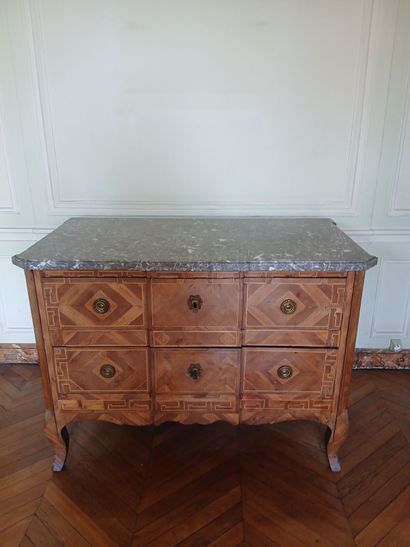 Center-recessed veneered wood chest of drawers...